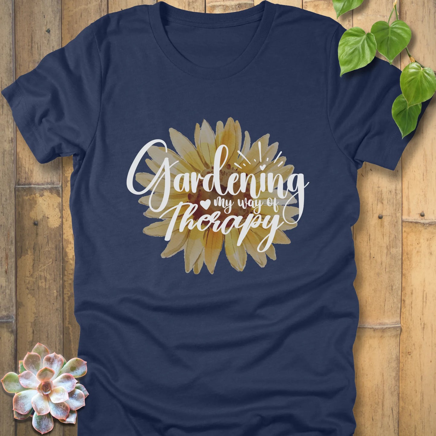 Heather navy t-shirt featuring the design Gardening my way of therapy with a sunflower in the center.