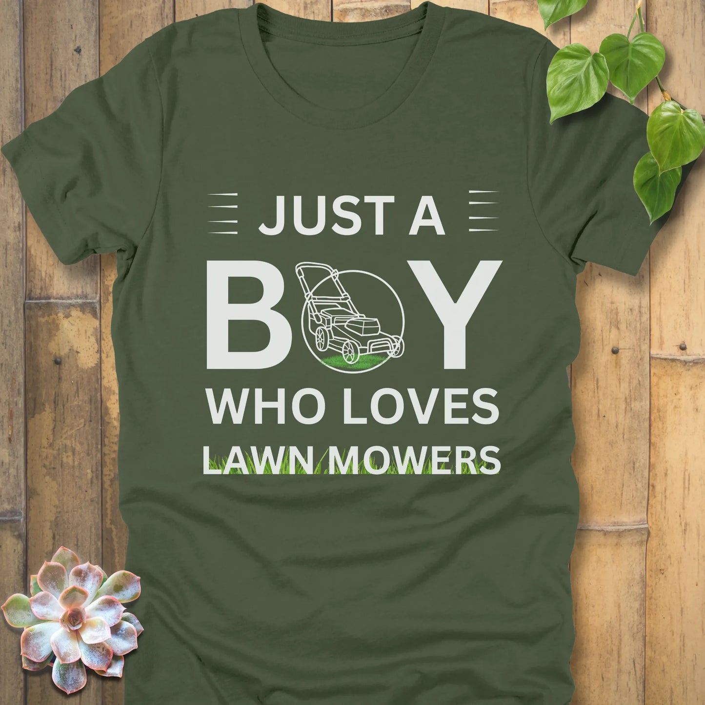 Military Green t-shirt featuring the design Just a Boy who loves lawn mowers printed with a lawn mower in the center