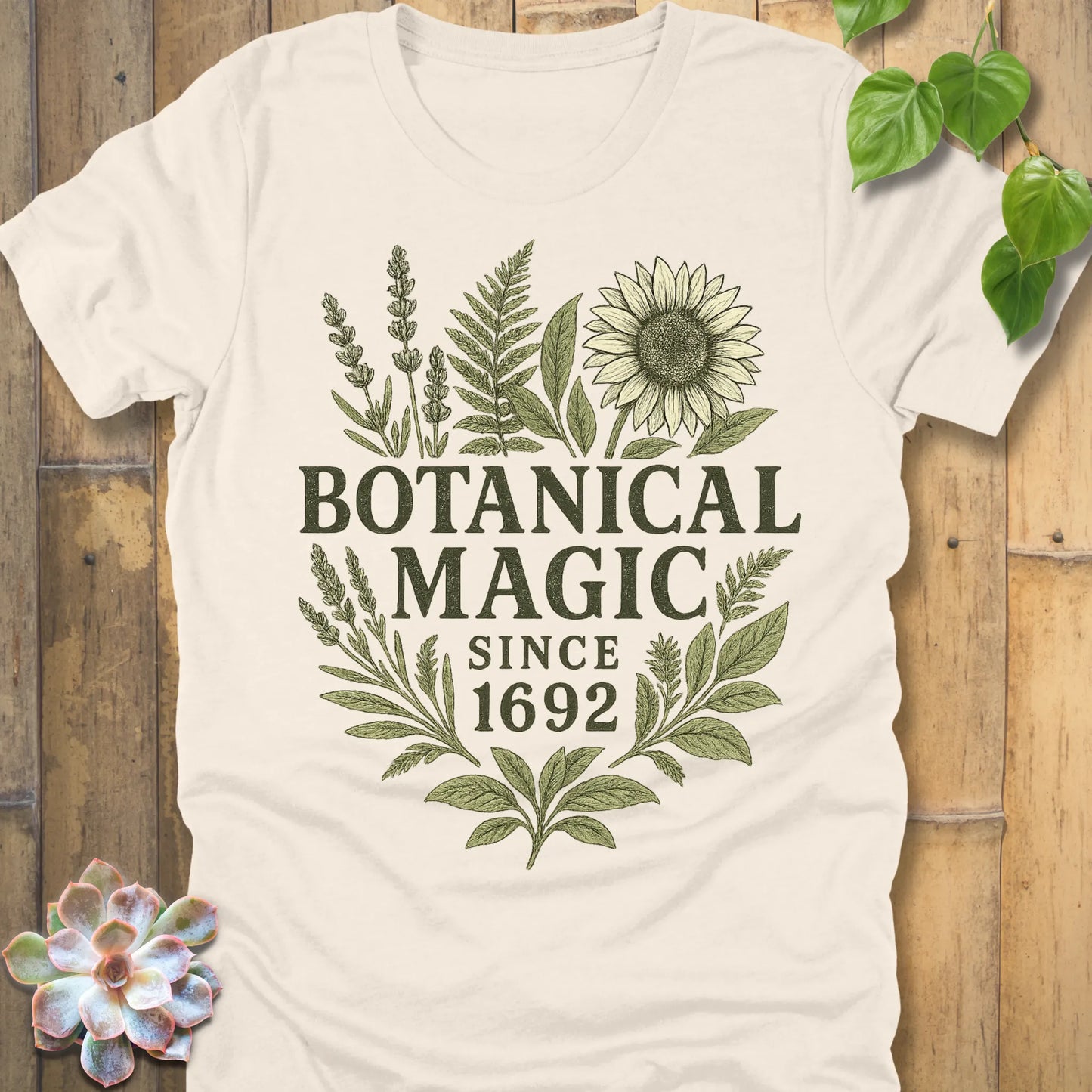 Natural t-shirt featuring the design Botanical Magic printed in bold letters, botanical garden shirt.