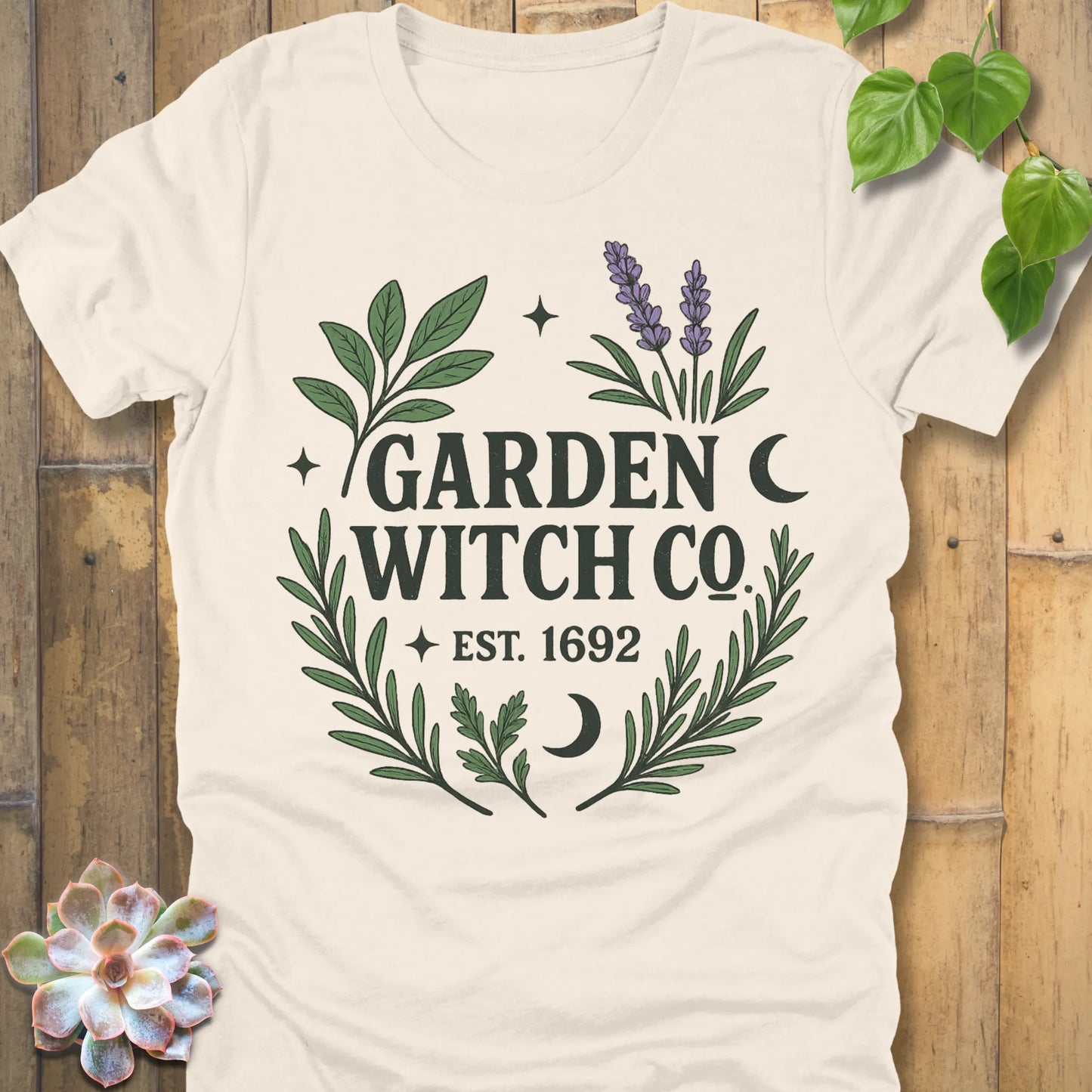 Natural t-shirt featuring the design Garden Witch printed in witchy garden shirt.