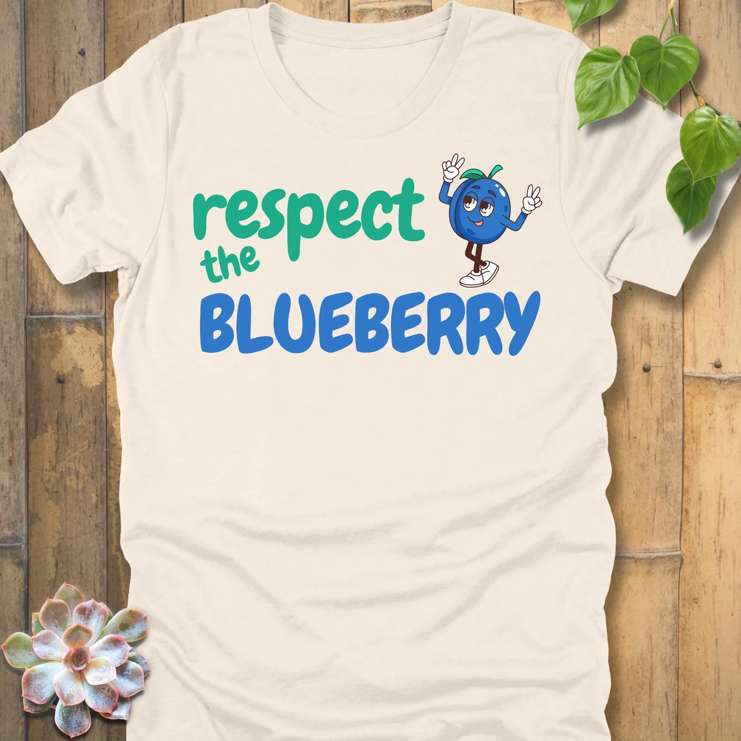 Natural t-shirt featuring the design Respect the Blueberry with a bold blueberry graphic, funny fruit lover shirt.