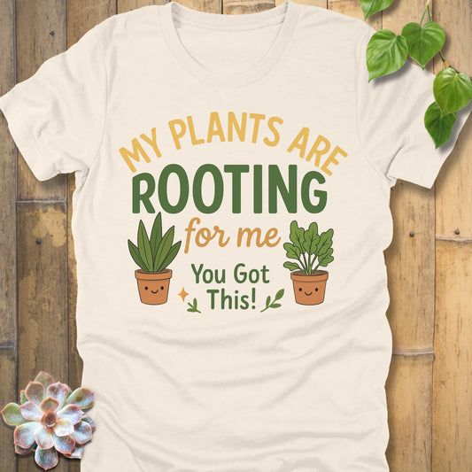 Natural t-shirt featuring the design Rooting For Me printed in bold letters and plants, gardening graphic tee.
