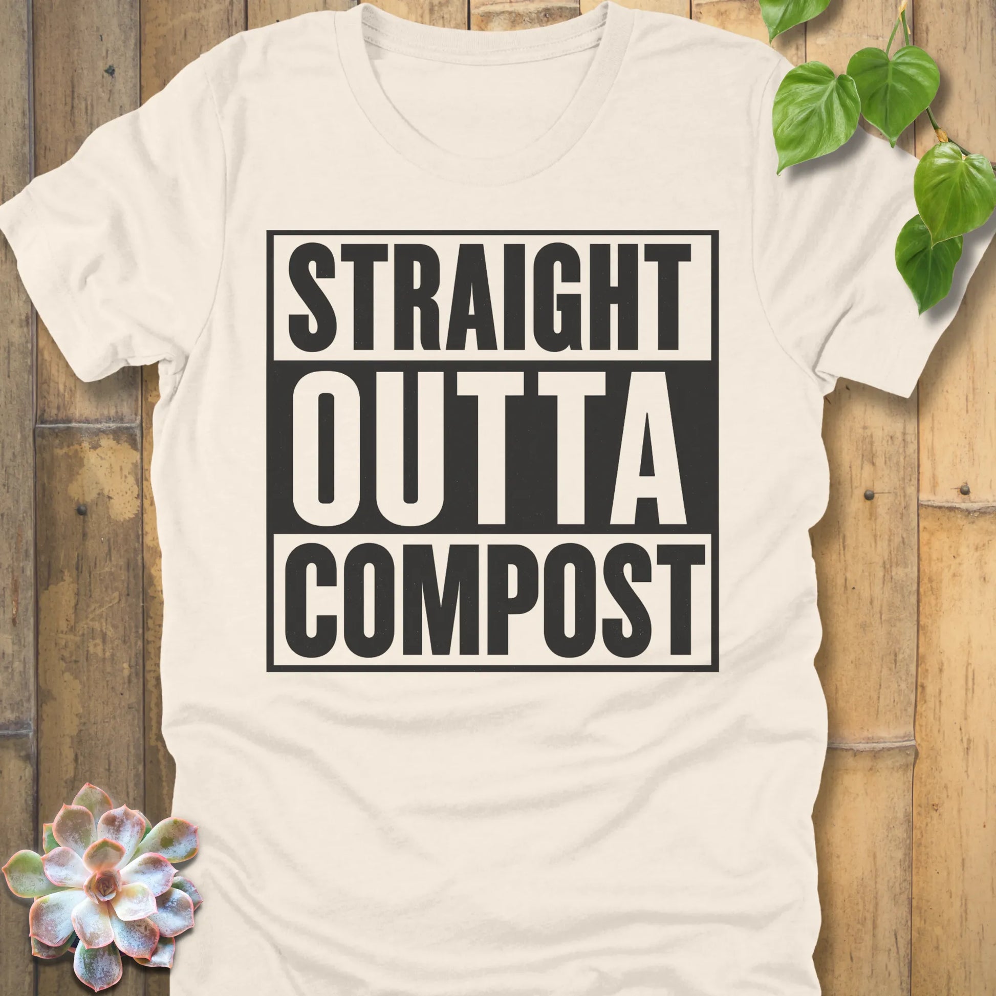 Natural t-shirt featuring the design Straight Outta Compost printed in bold letters, funny gardening shirt.