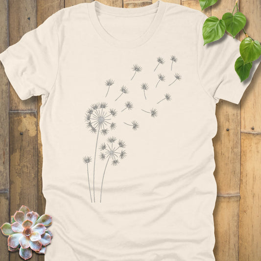 Natural t-shirt featuring the design Wishes Come True printed in floral graphic tee.