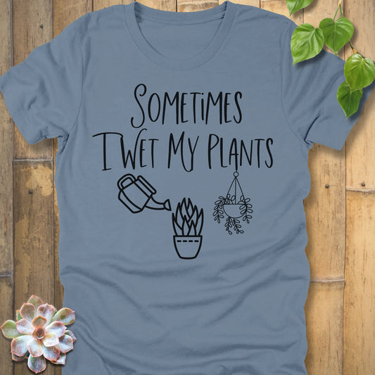 Steel Blue t-shirt featuring the design I Wet My Plants printed in bold black letters, gardening humour t-shirt.