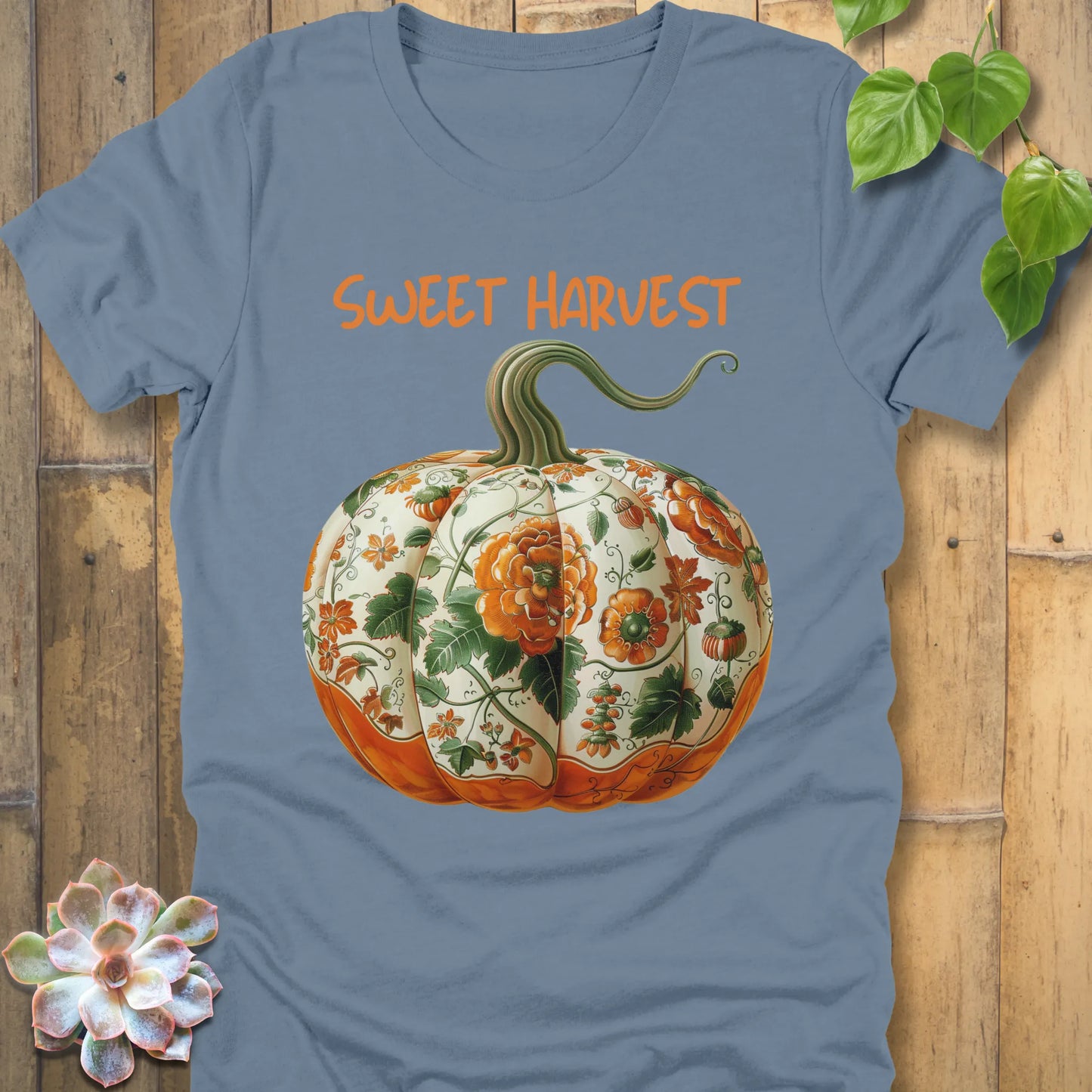 Steel Blue t-shirt featuring the design Sweet Harvest printed in bold orange letters and a halloween pumpkin design