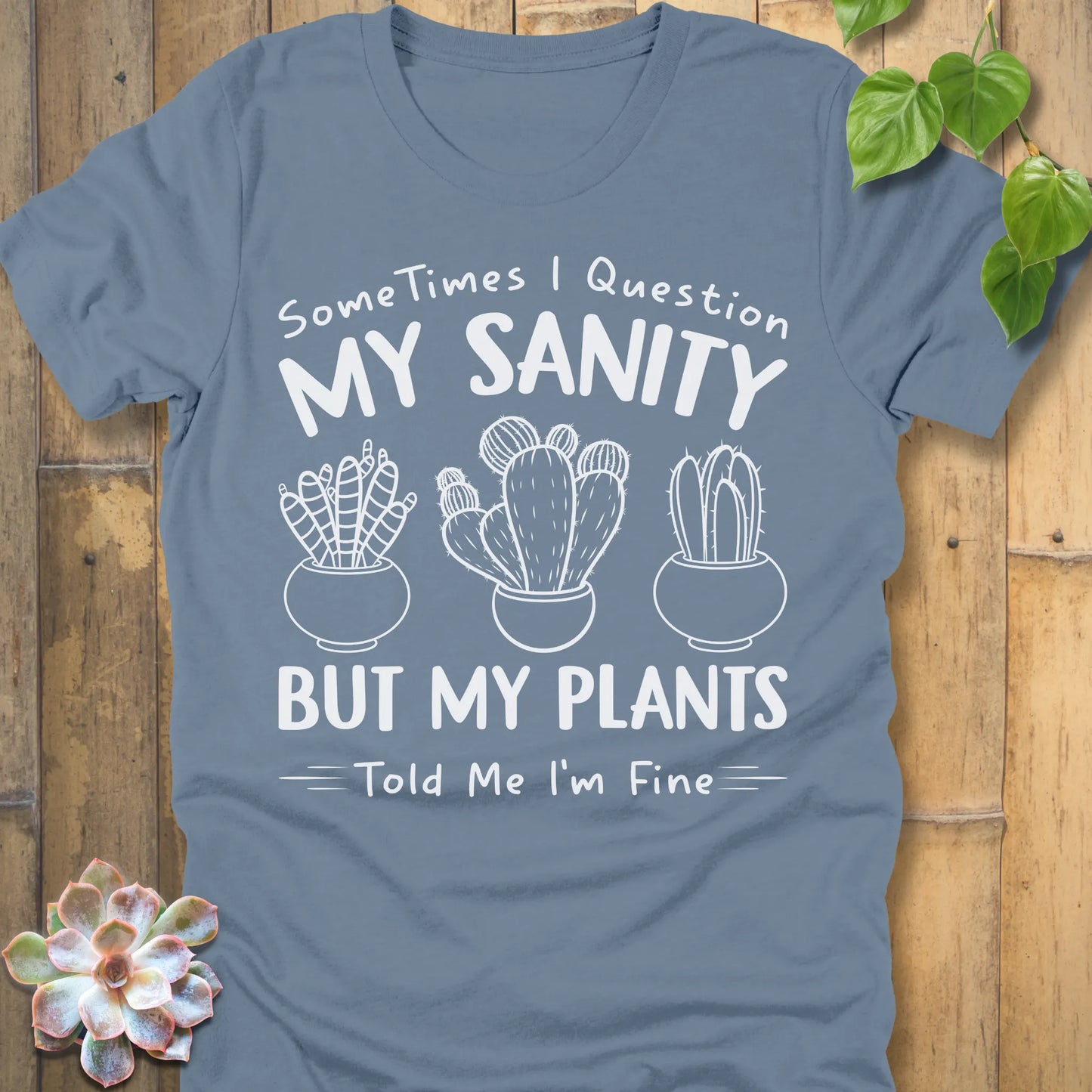 Steel Navy t-shirt featuring the design I'm Fine printed in bold white letters, ang plants