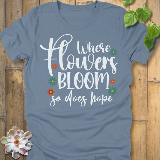 Steel blue t-shirt featuring the design Where Flowers Bloom printed floral graphic tee.