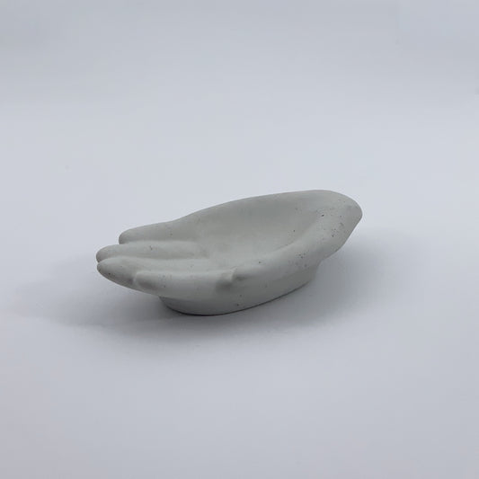 hand-shaped concrete decor

